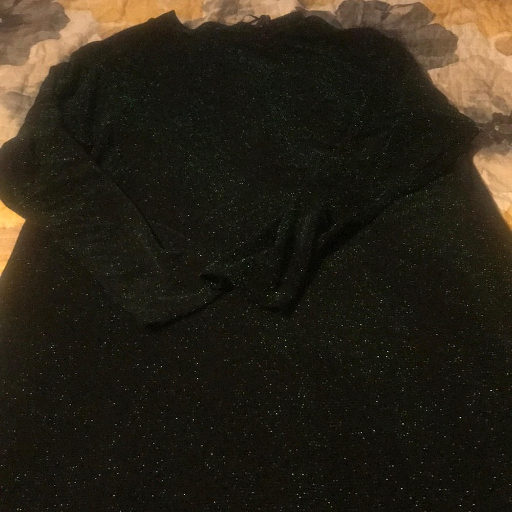 Fully lined long sleeve black with green sparkle below the knee dress